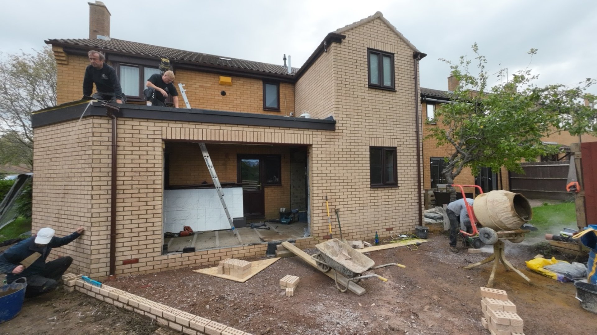 Builders in Milton Keynes: Crownhill Building Services team constructing a brick home extension
