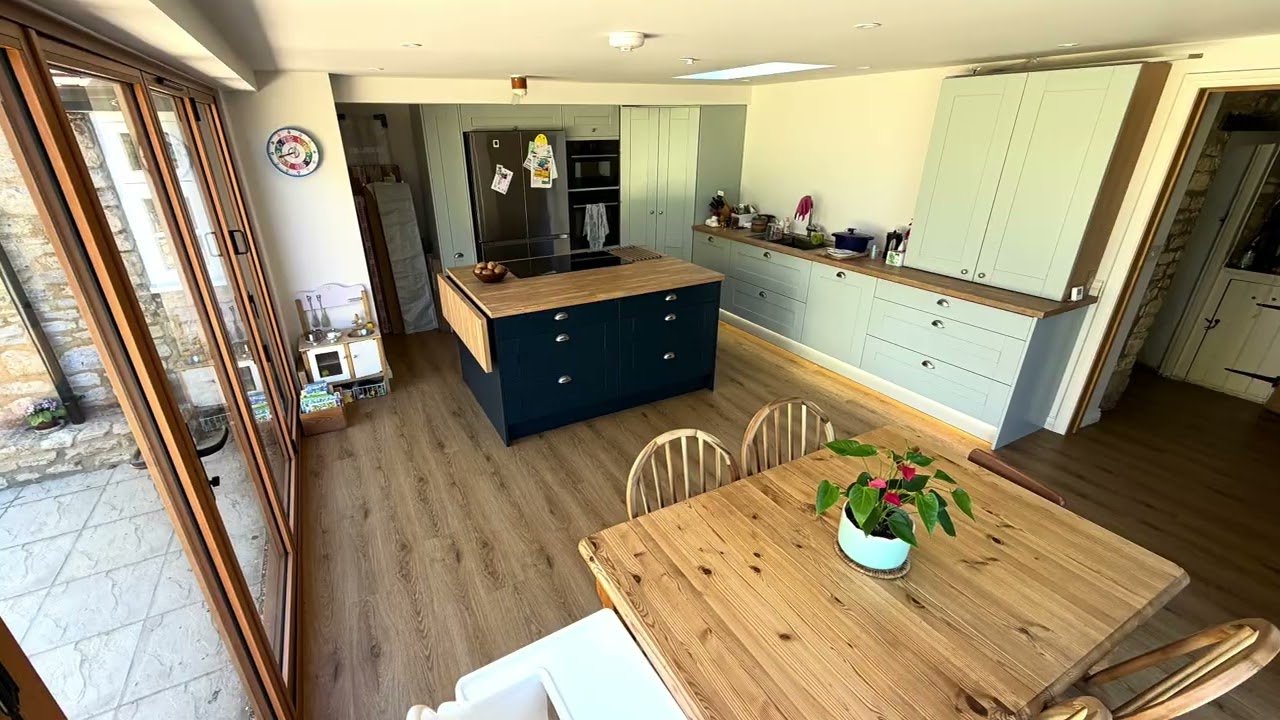 Customer testimonial video - Contemporary kitchen extension with large windows and oak aluminium bi-fold doors in Castlethorpe